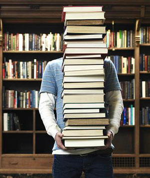 carrying-stack-books