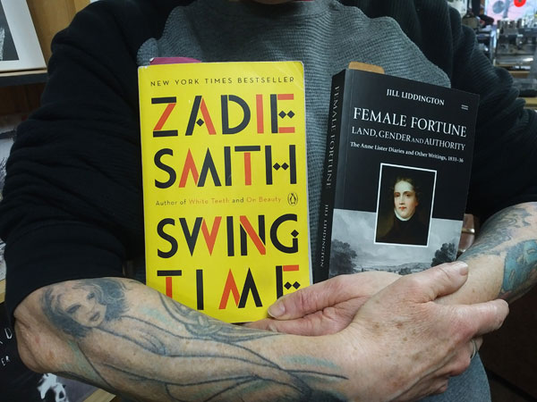 Silent book club member presents books by Zadie Smith and Jill Liddington