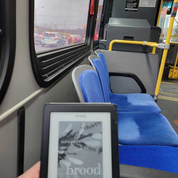 Todd reads on transit