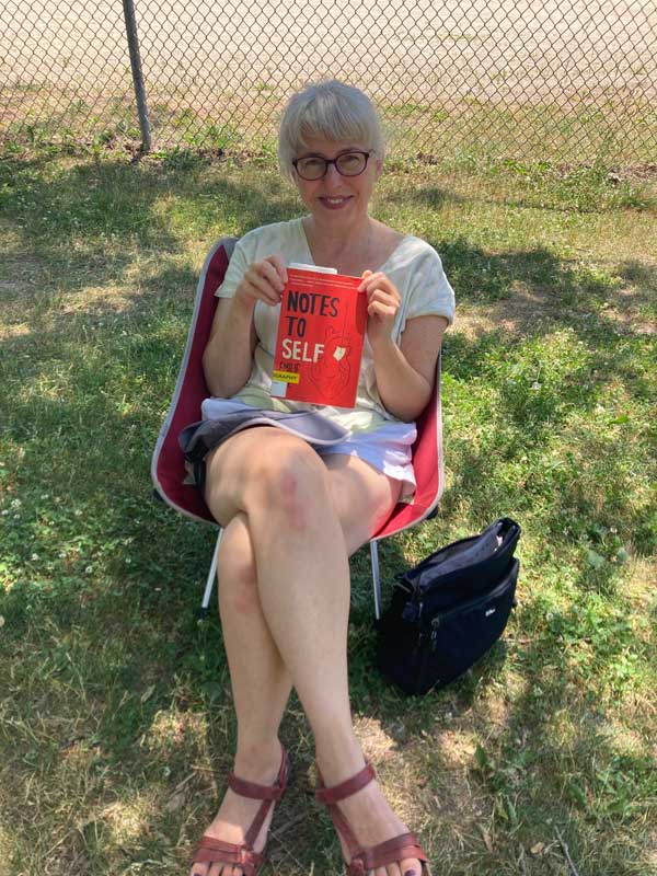 Catherine reading in the park