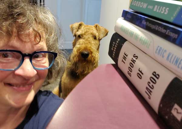 Vicki's reading spot, with reading companion Tilly the Airedale