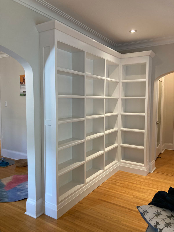 Silent book club member Emily's magnificent bookshelves, awaiting books (Photo by Emily Petroff)