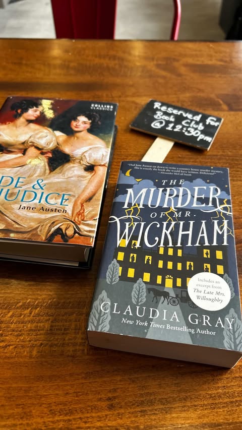 Silent book club member Ruth's books, including The Murder of Mr. Wickham by Claudia Gray (Photo by Ruth Bartlett)