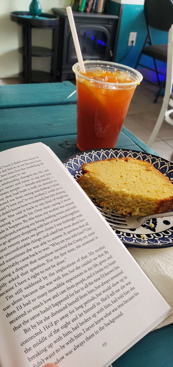 Reading and enjoying delicious cakes and beverages at Sprouty Cafe (Photo by Vicki Ziegler)