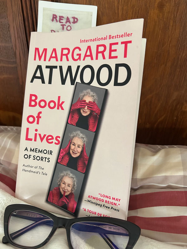 Silent book club member Jess is reading Margaret Atwood's memoir Book of Lives (Photo by Jess Bootsma)